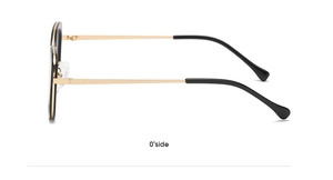 Side view of chic cat-eye glasses with black frames and slender golden metal temples