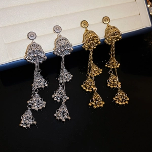 Vintage Jhumka tassel earrings in gold and silver finish with ethnic bell design