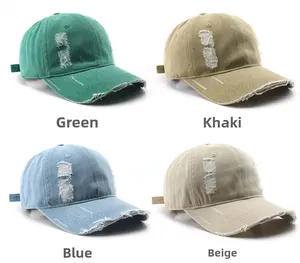 Detail view of distressed baseball caps in green, khaki, blue and beige colors