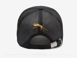 Detail of black mesh baseball cap featuring gold embroidery and adjustable silver buckle