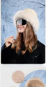 Detail of windproof beige winter bucket hat with faux fur trim and quilted design