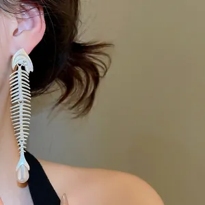 Fishbone drop earrings with zircon head and teardrop pearl on silver metal base