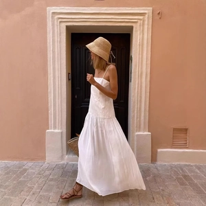 Elegant white pleated camisole maxi dress for women in a chic holiday vacation style