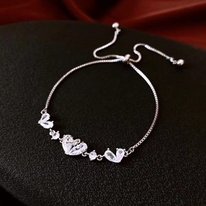 Detailed view of adjustable box chain bracelet with heart-shaped cubic zirconia