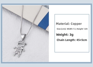 Detail of little boy pendant necklace with white cubic zirconia in platinum plated copper