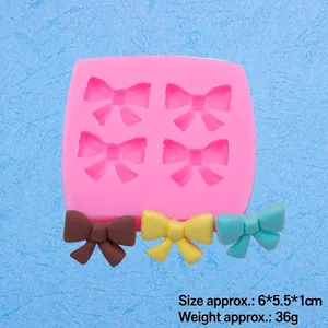 Moule en silicone rose en forme de nœud pour fondant et chocolat avec modèles