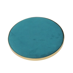 Detail of turquoise velvet jewelry display tray with elegant polished gold metal rim