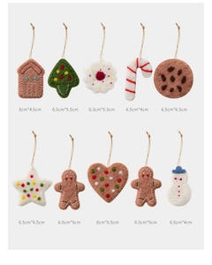 Detail view of 10 assorted Christmas felt ornaments with specific size measurements