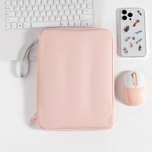 Detail of pink waterproof tablet sleeve with zipper closure and gray carry strap