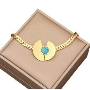Gold stainless steel flat snake chain necklace with round turquoise pendant in jewelry box