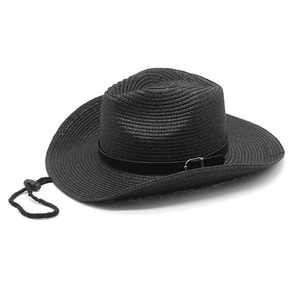 Detail of black woven cowboy straw hat with silver buckle leather band and chin strap