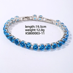 Detail view of 19.5cm silver tennis bracelet with round blue cubic zirconia stones