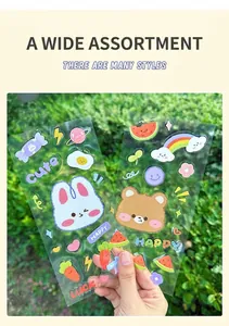 Close-up of cute cartoon bear and bunny waterproof PVC stickers for scrapbooking decor
