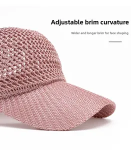 Detail of pink mesh summer baseball cap with adjustable wide brim for sun protection