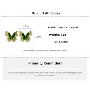 Detail view of crystal butterfly earrings with dimensions 2.2x2.1cm and 7.6g weight