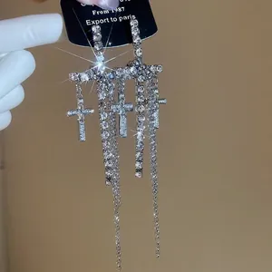 Silver needle rhinestone cross tassel earrings with sparkling crystals and cool style