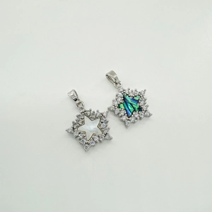 Star-shaped 18k plated pendants with mother of pearl and sparkling zircon stones