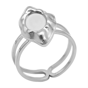 Detail of adjustable silver ring with double-line band and white oval inlay detail
