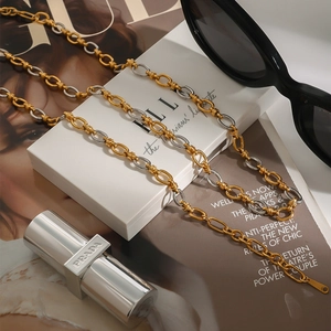 Two-tone 18k gold and silver titanium steel chain necklace with textured oval links