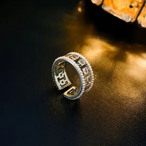 Luxury gold plated open ring featuring square zircon with elegant pearl trim detailing