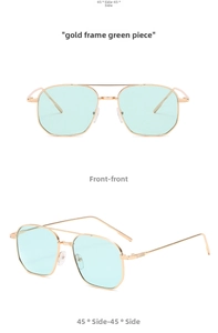 Detail view of retro double bridge metal sunglasses with green lenses in a gold frame