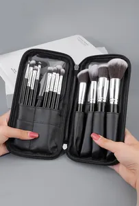 Detail of 12pcs black professional makeup brushes set with portable zipper storage case