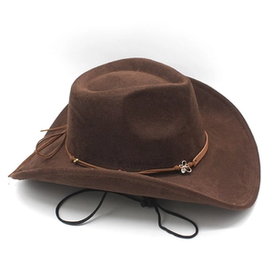 Detail of dark brown faux suede cowboy hat with butterfly buckle and windproof cord