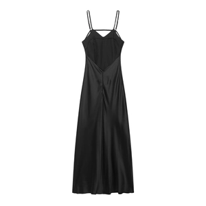 Detail of the back showing backless design and thin straps of a black satin midi dress