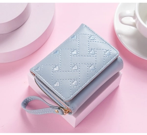 Light blue women short wallet with cute embroidered hearts and wrist strap compact size.