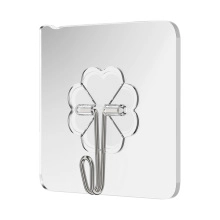 Strong transparent adhesive wall hook with decorative clover pattern and metal U-shaped hanger