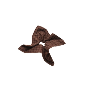 Brown plaid fabric scrunchie with bow tie design for low ponytail hairstyles