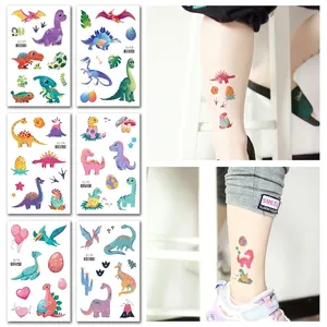 Glitter dinosaur temporary tattoos for kids with colorful T-Rex and volcano designs