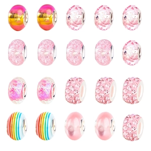 Macro shot of 20 pink European large hole glass beads with silver metal inner cores