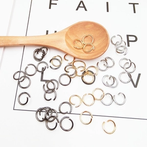 Assorted gold, silver, and gunmetal jump rings for DIY jewelry and keychain making