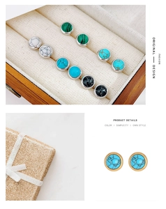Detail of round gemstone stud earrings in turquoise and marble with vintage metal bases