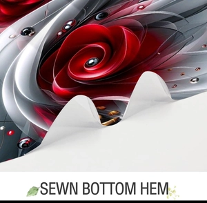 Close-up detail of the sewn bottom hem on a floral print fabric shower curtain