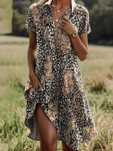 Damen Kurzarm V-Ausschnitt Blumenkleid in Schwarz mit orangefarbenen Blumen für den Sommer