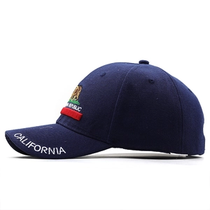 Detail view of navy blue cotton baseball cap featuring California bear embroidery