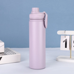 Close-up of purple vacuum insulated sports bottle with portable lid and matte finish