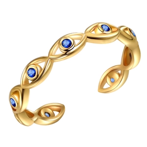 Gold Evil Eye open ring featuring blue zircon stones in a modern minimalist style