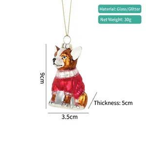 Detail view of a glass puppy ornament with red sweater showing dimensions 9cm by 3.5cm