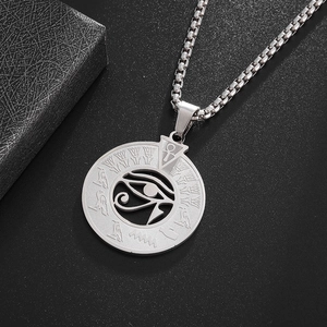 Silver stainless steel necklace with Eye of Horus Egyptian symbols pendant on black texture