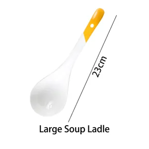 Detail of a 23cm long white ceramic large soup spoon with a yellow hanging handle