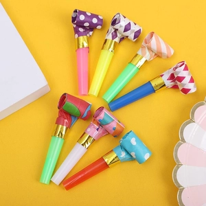Colorful party blowouts with polka dots and stripes patterns on a bright yellow background