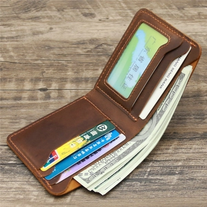 Detail view of brown crazy horse leather wallet with multi-card slots and ID window