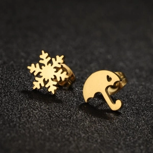 Golden asymmetrical snowflake and umbrella stud earrings made of stainless steel