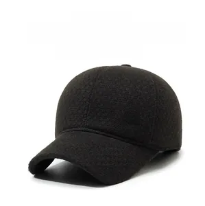 Detailed texture of dark coffee wool baseball cap with metallic Fashion plate and warm ear flaps