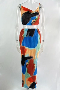 Detail of plissé fabric texture and abstract oil painting print on 2-piece skirt set