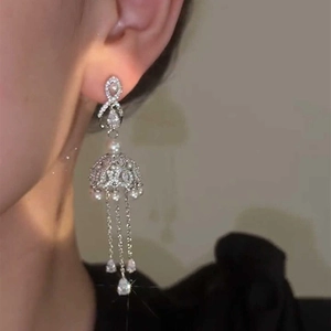 Silver needle bow earrings with pearl tassel drop and zircon stones for women