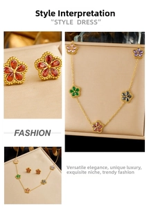 Detailed close-up of gold-plated flower jewelry set with colorful water-drop crystals